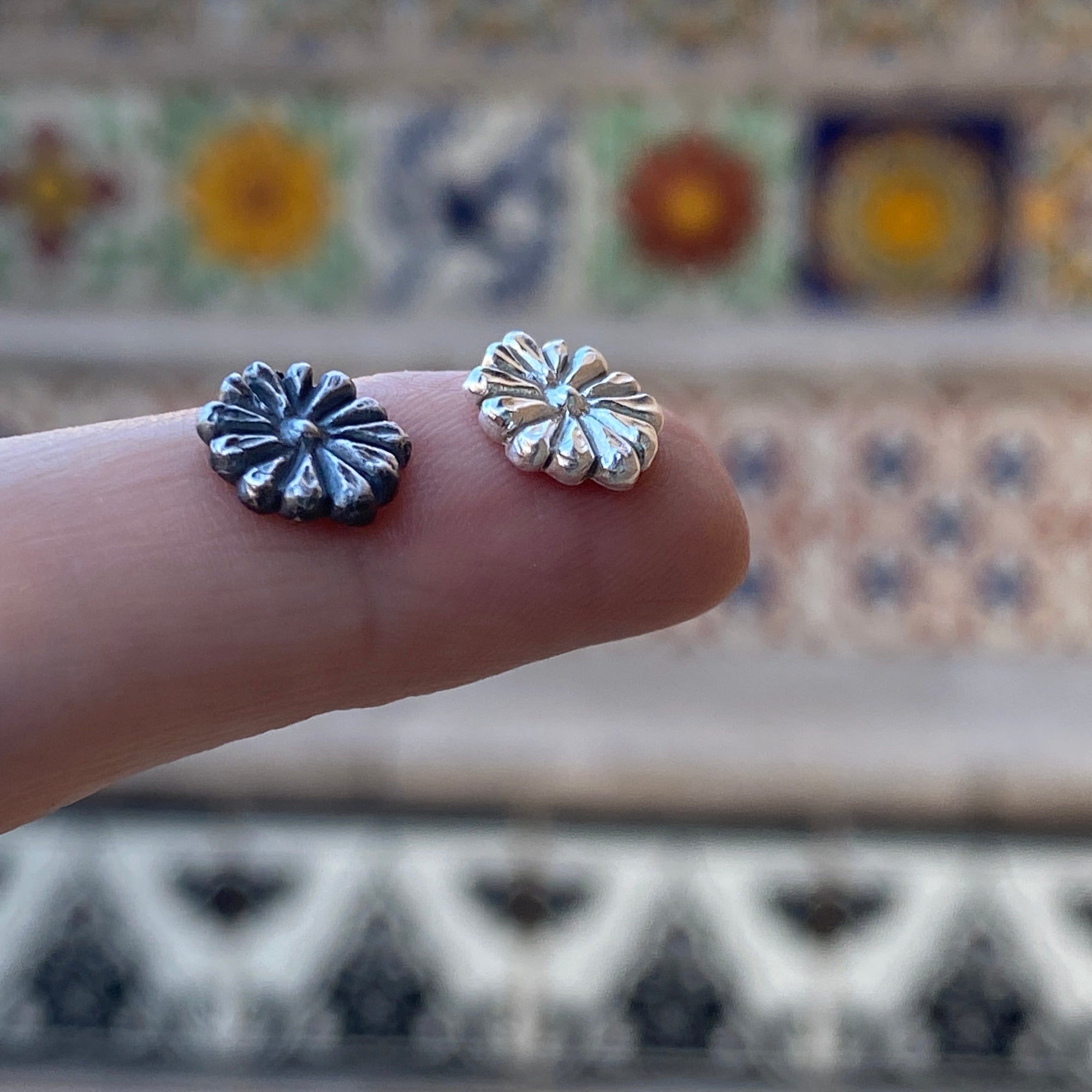 cast silver flowers with patina and left shiny